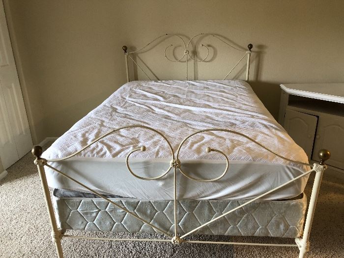Full size bed and frame. Serta mattress. Frame is 60 years old and mattress is nearly new and firm. Mattress has been protected with waterproof cover. 