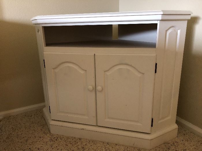 Terrific Cherry corner cabinet that was painted to match other furniture described above. Use as a TV stand or use to display a table lamp, artwork, etc. 