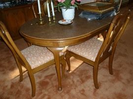 Table w/6 chairs in antique walnut by Davis Furniture Co.