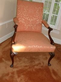 Beautiful old upholstered chair w/carved arms and legs