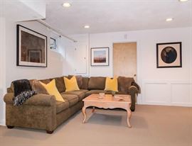 Brown sectional, coffee table, custom pillows and all sorts of other great stuff!