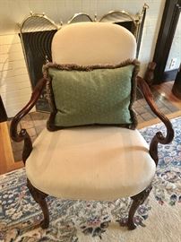 Elegant wood and upholstered lolling chair