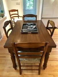 Kitchen dining table purchased at Domain. Includes 6 side chairs and 2 armchairs. Newly upholstered seats by Partners in Design in Newton. 