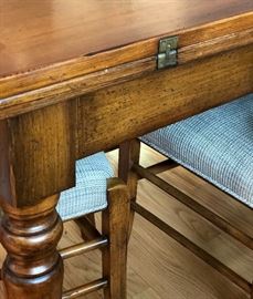 Table flips open to create a square.