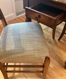 Table has drawer on either side.