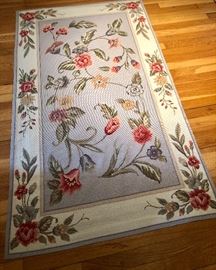 Needlepoint rug in grays and pinks