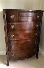 Tall, Chippendale style mahogany dresser with same top drawer configuration as the matching bureau. 
