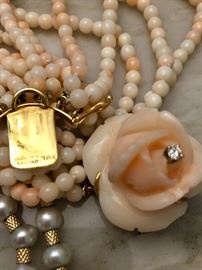 Cellino Angel Skin Coral and 18K multi-string bracelet with diamond center.