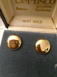 Like a flattened M&M - pretty 14K gold buttons.