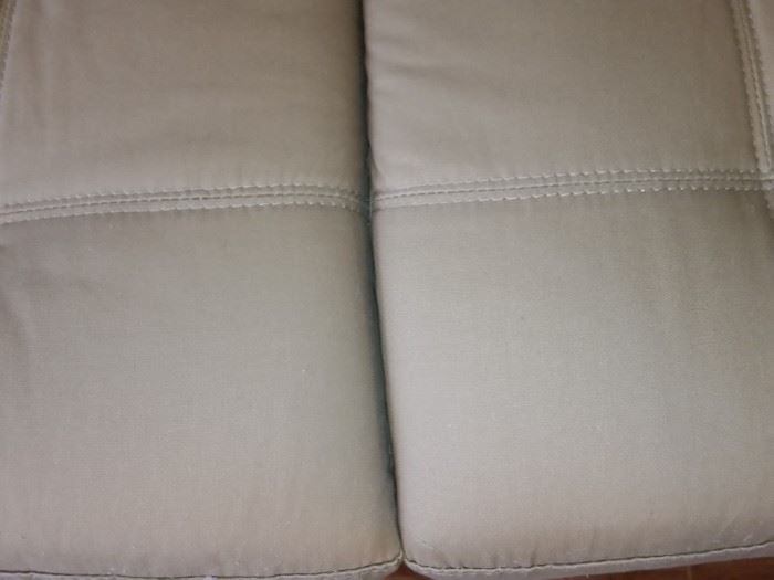A closer look at the fabric on the sofa.