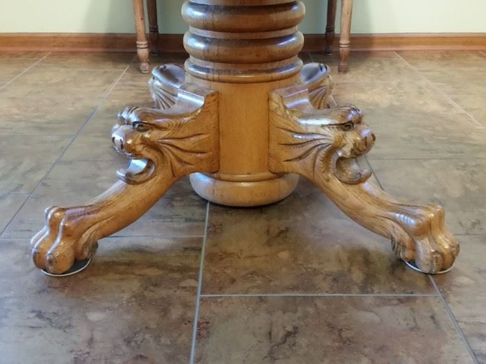 A closer look at the carving on the oak pedestal table