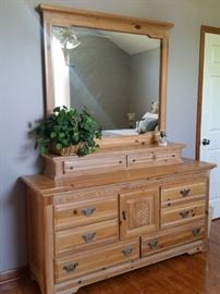 This dresser with mirror matches the two nightstands