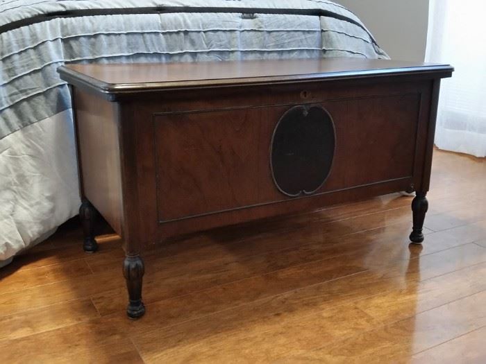 Antique blanket chest is walnut on the outside and cedar on the inside
