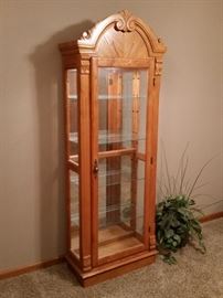 Tall oak curio/china cabinet with glass shelves