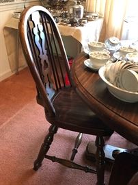 Dark Pine pedestal table with four Windsor chairs 
