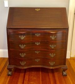 Antique serpentine, slant front desk.