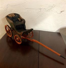Antique doll house buggy