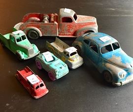 Antique toy cars and trucks - one taxi