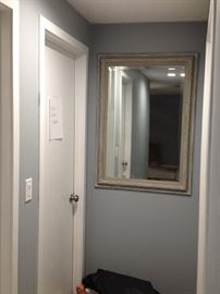 One of several wall, floor and door mirrors