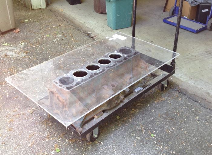 Fun repurposed auto engine with lucite top for coffee table.  Great conversation piece for that man cave, cabin or industrial decoration!