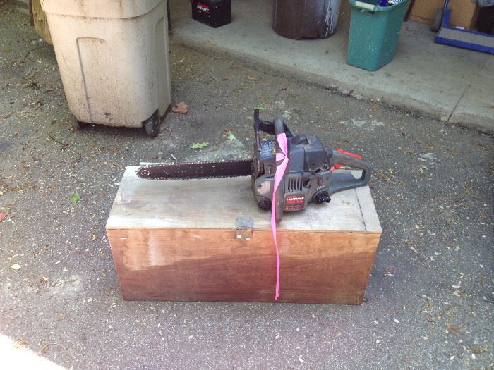 Chainsaw with wood box and supplies