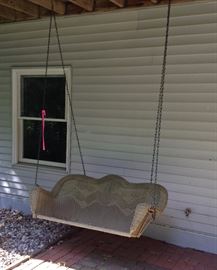 Wonderful wicker swing for your porch or deck!