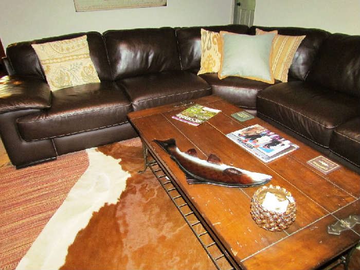 Real leather sectional couch with iron & wood coffee table