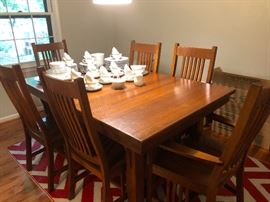 Mission style dining room set with expandable leaf