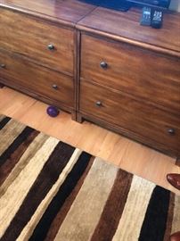 Pair of current; and well made file cabinets, featured carpet in beige; and browns