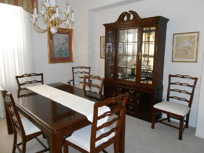 Dining room table and chairs with matching china hutch