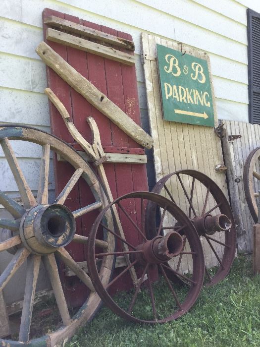 Antique farm wheels, bead board, barn wood remnants, wagon wheels