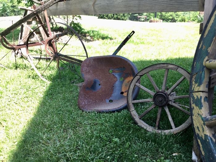 Antique tractor seats, wagon wheels, ploughs, and more! 