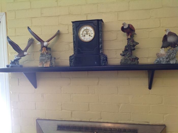 Bird figurines and French chiming clock.