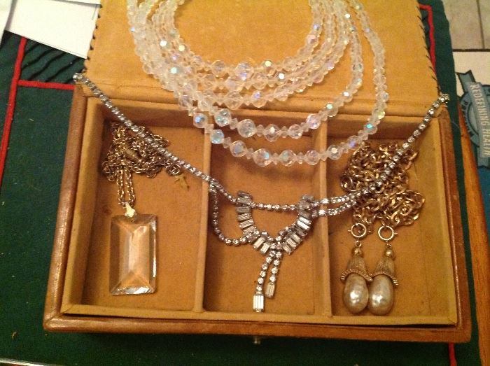 Vintage jewelry, pins, earrings.