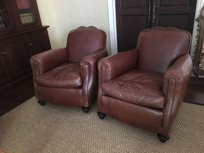 Lot#6 French Deco leather club chairs. One is priced at 1200.00 the other is 800.00 due to a foot that needs repair (Originally 8000.00/pr. including recovering one chair)