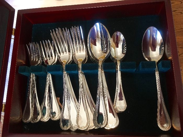 Lot #34 Christofle "Beauharnias" stainless flatware service for 8 (missing one spoon) 450.00