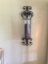 Pair of beautiful wall sconces that hold large candles. Price: Please inquire when calling for appointment.