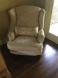 This large wingback chair is upholstered in a beautiful ivory colored material. The chair is in great condition. Price: $75