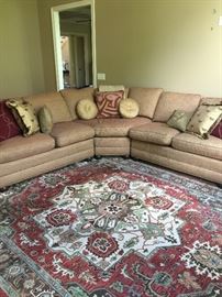 This large sectional is a King Road collection by Taylor King. The gold and red section sofa is 9' x 9', end to end. It is comfortable, in great condition, and able to turn an ordinary room into a welcoming one. It is bargain priced. Price: $950.