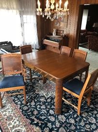 Dining table with 5 chairs and table pads