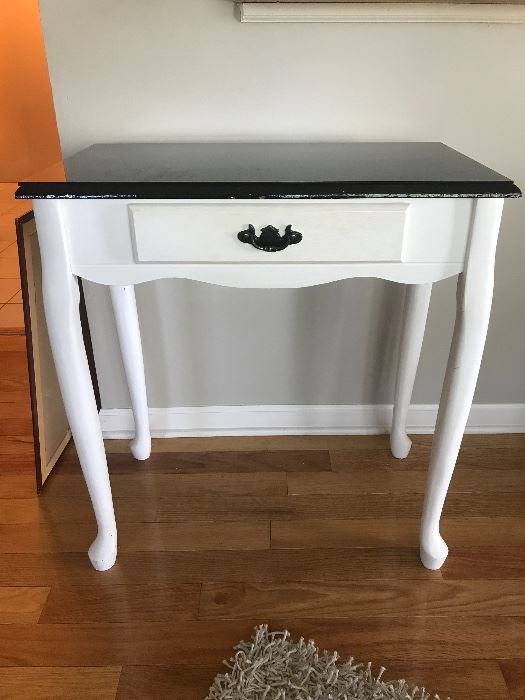 White table with black top