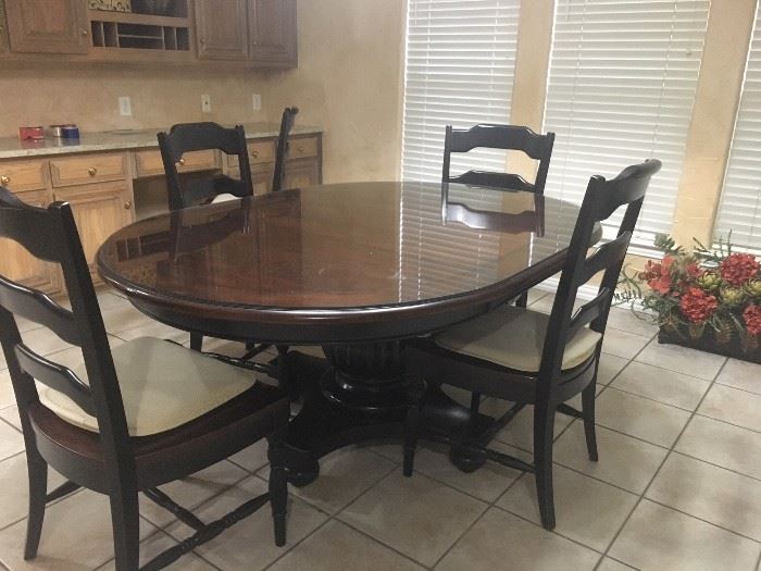 Table and 6 Chairs -- this has a glass top  that protects the wood  Hooker Brand