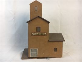 Illuminated wooden Golden Grain elevator co. building