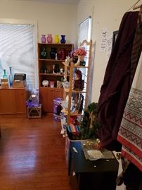 There are 2 Teak Bookcases with a cabinet on the bottom. To the left is the teak credenza or buffet. The doors side open.