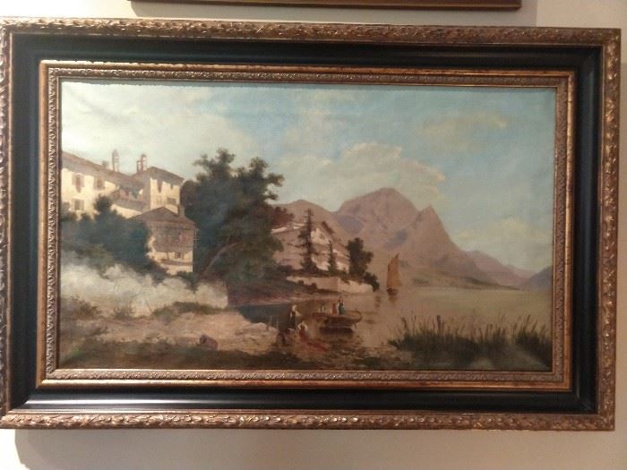 Early 20th cent. oil on canvas depicting a serene mountain lake scene in the northern Italian alpine foothills, unsigned, measures 18" h x 31" w, overall size including frame 25"h x 37.5"w x 2.5"d.