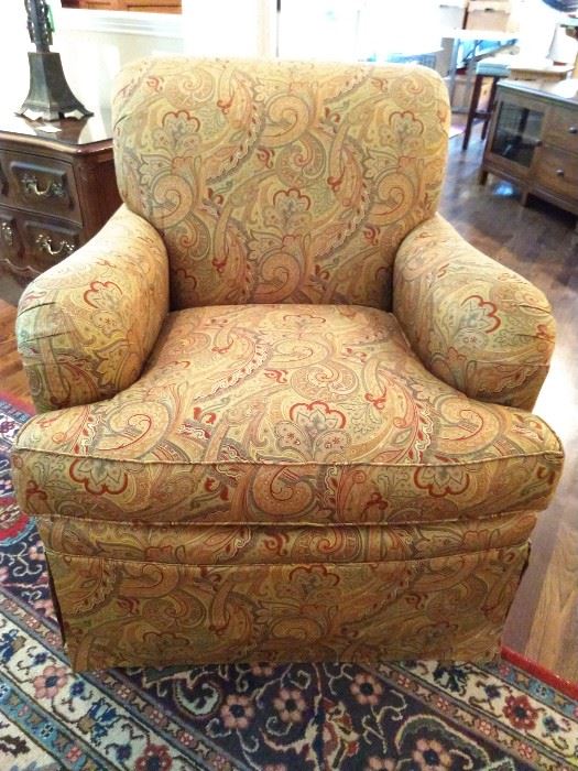 One of a pair of Grizzel And Mann paisley upholstered armchairs.