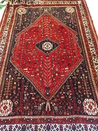 Vintage hand woven Persian Qashqai rug, 100% wool face, measures 10' 7" x 7' 3".