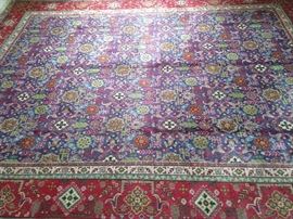 This 10' x 12' vintage Persian Kashan sets the mood for doing it like animals, on the Discovery Channel.