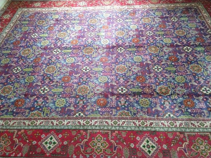 This 10' x 12' vintage Persian Kashan sets the mood for doing it like animals, on the Discovery Channel. 