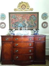 1940's vintage Drexel New Travis Court mahogany buffet, pair of hand painted plates by Christine Viennet, (France) collection of crystal decanters, unusual beaded tapestry.                                                                                     
Overhead is a vintage French heraldic fragment - yummy!